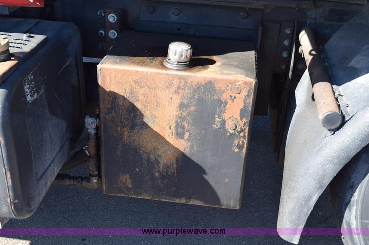 image for item J1989 2002 Chevrolet C8500 dump truck