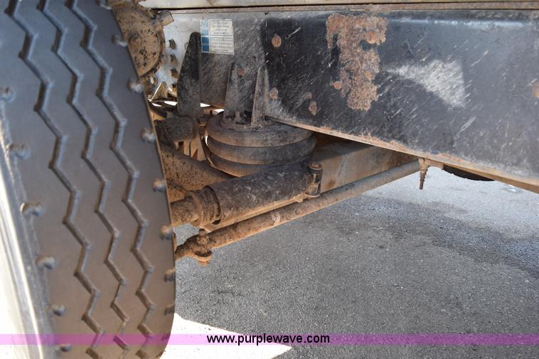 image for item J1989 2002 Chevrolet C8500 dump truck