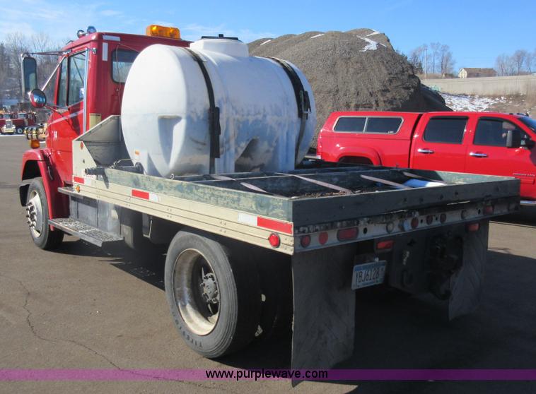 image for item J1992 1998 Freightliner FL70 flatbed truck