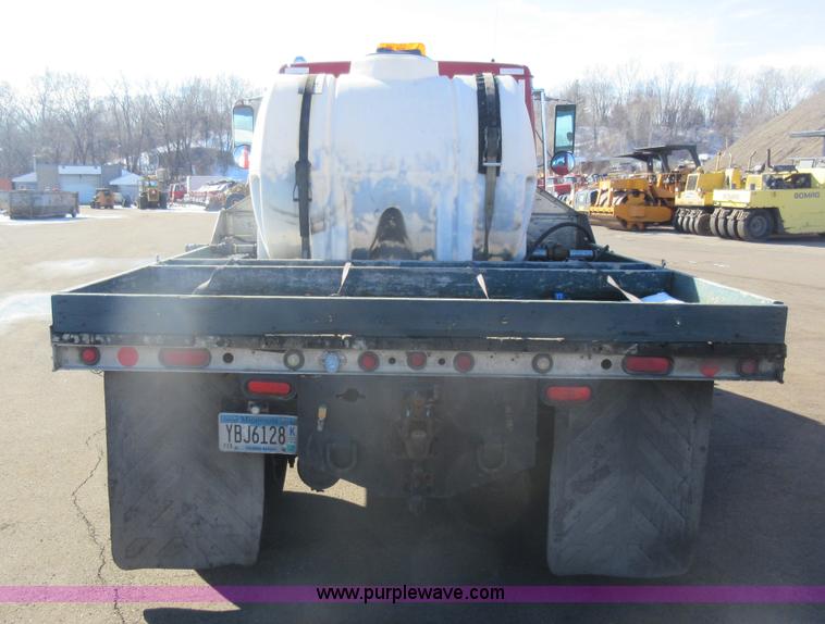 image for item J1992 1998 Freightliner FL70 flatbed truck