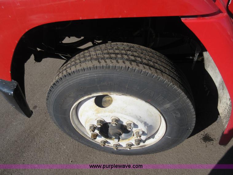 image for item J1992 1998 Freightliner FL70 flatbed truck