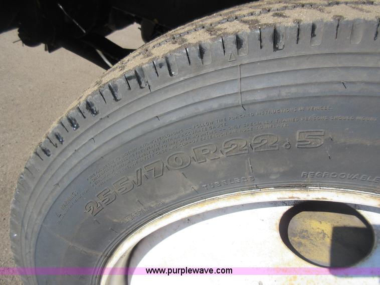 image for item J1992 1998 Freightliner FL70 flatbed truck