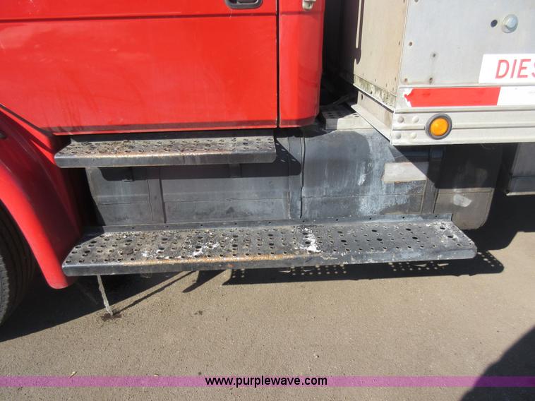 image for item J1992 1998 Freightliner FL70 flatbed truck