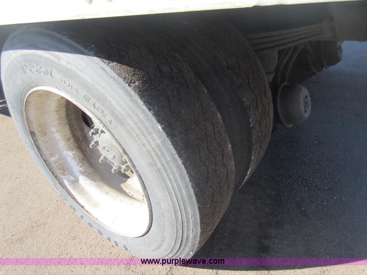 image for item J1992 1998 Freightliner FL70 flatbed truck