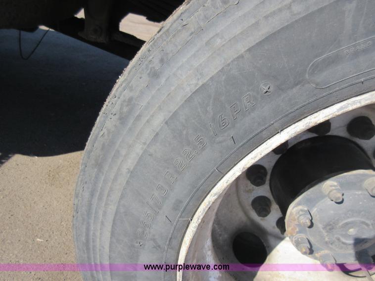 image for item J1992 1998 Freightliner FL70 flatbed truck