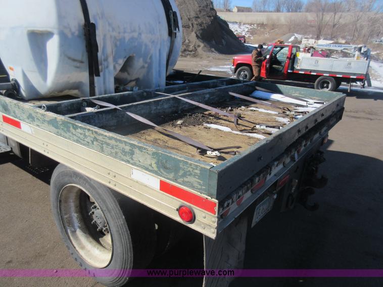 image for item J1992 1998 Freightliner FL70 flatbed truck