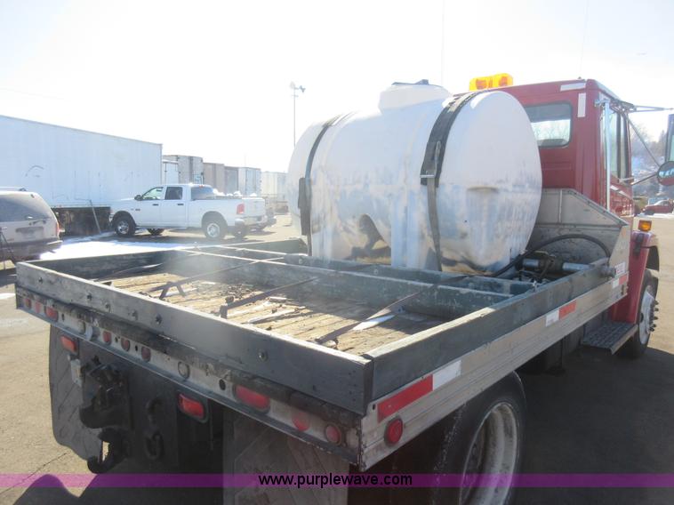 image for item J1992 1998 Freightliner FL70 flatbed truck