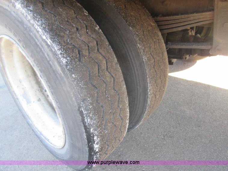 image for item J1992 1998 Freightliner FL70 flatbed truck