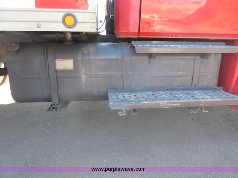 image for item J1992 1998 Freightliner FL70 flatbed truck