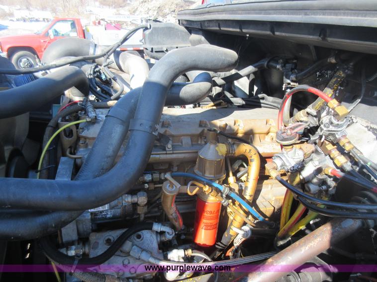 image for item J1992 1998 Freightliner FL70 flatbed truck