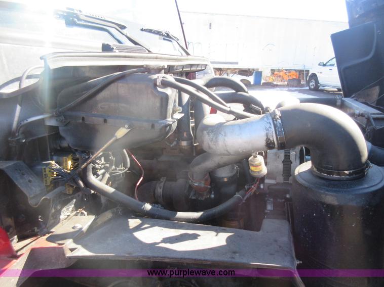 image for item J1992 1998 Freightliner FL70 flatbed truck