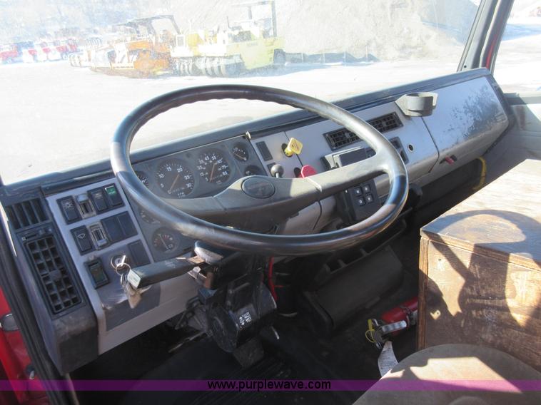 image for item J1992 1998 Freightliner FL70 flatbed truck