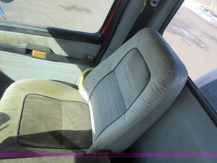 image for item J1992 1998 Freightliner FL70 flatbed truck