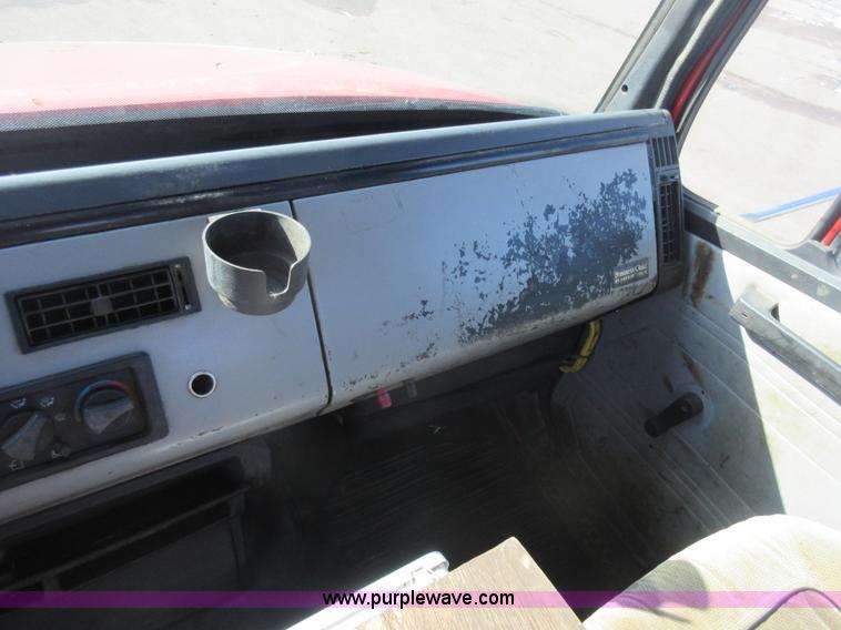 image for item J1992 1998 Freightliner FL70 flatbed truck