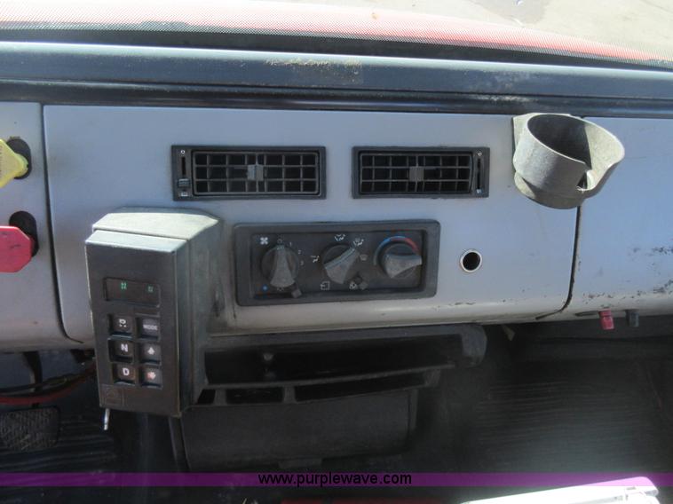 image for item J1992 1998 Freightliner FL70 flatbed truck