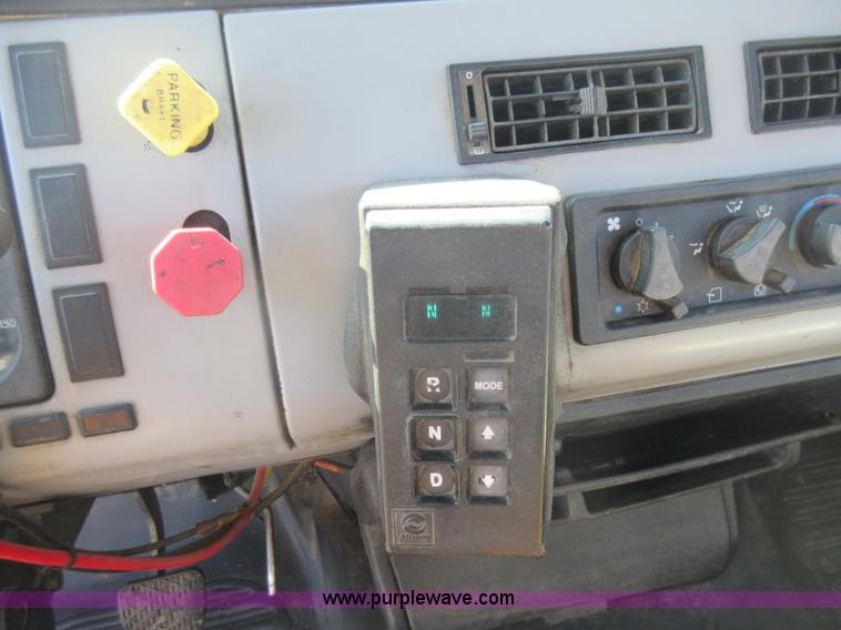 image for item J1992 1998 Freightliner FL70 flatbed truck