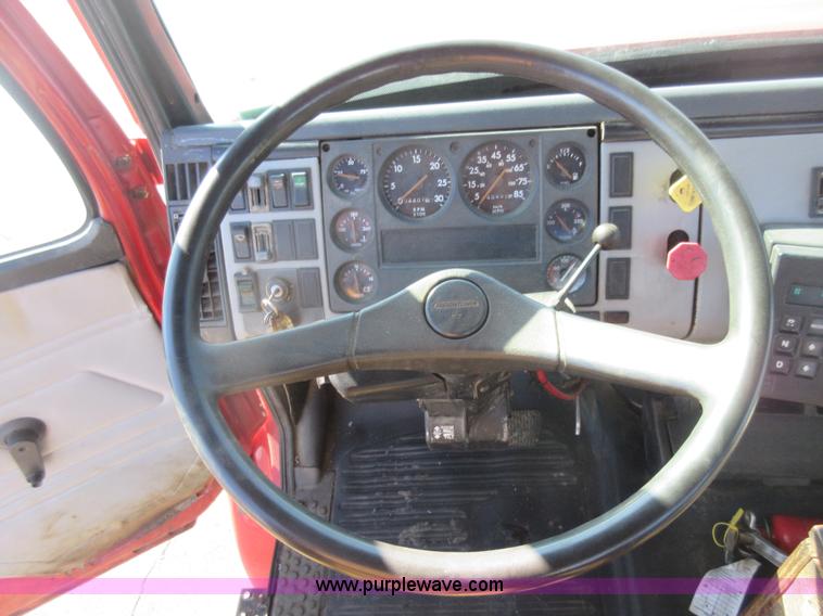 image for item J1992 1998 Freightliner FL70 flatbed truck