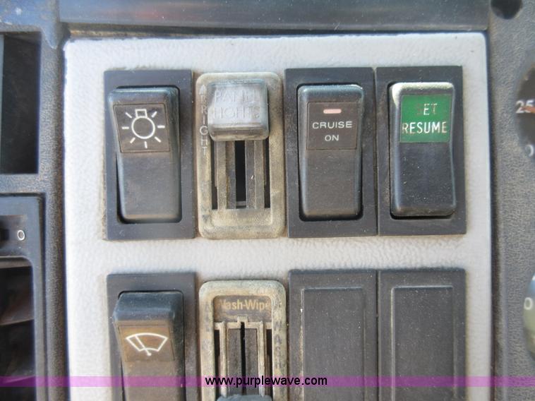 image for item J1992 1998 Freightliner FL70 flatbed truck