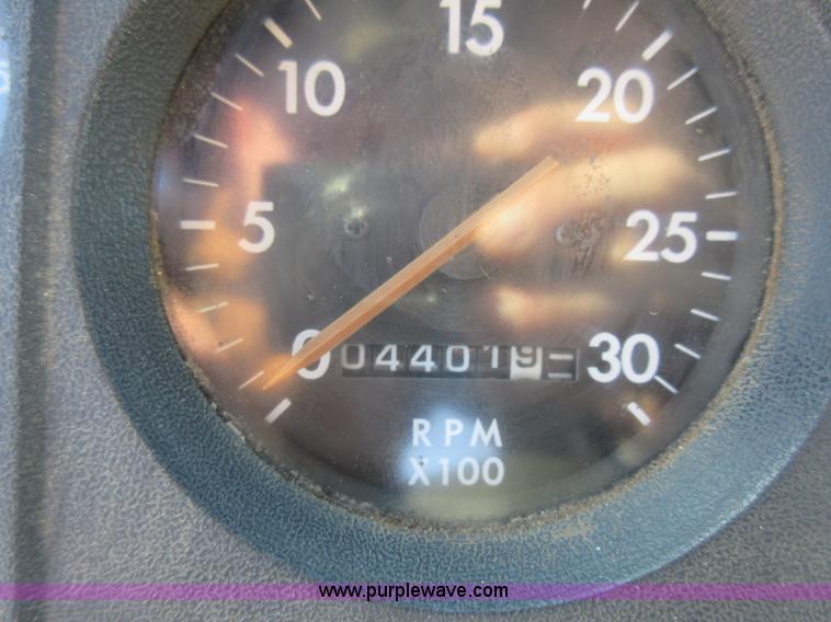 image for item J1992 1998 Freightliner FL70 flatbed truck