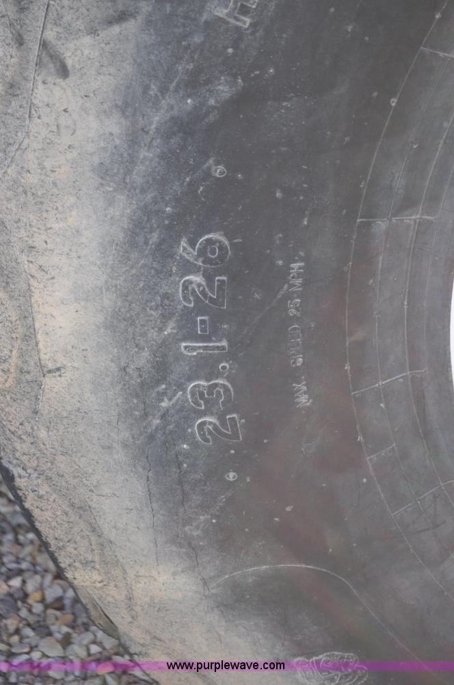 image for item F2279 2008 MacDon M200 self-propelled windrower