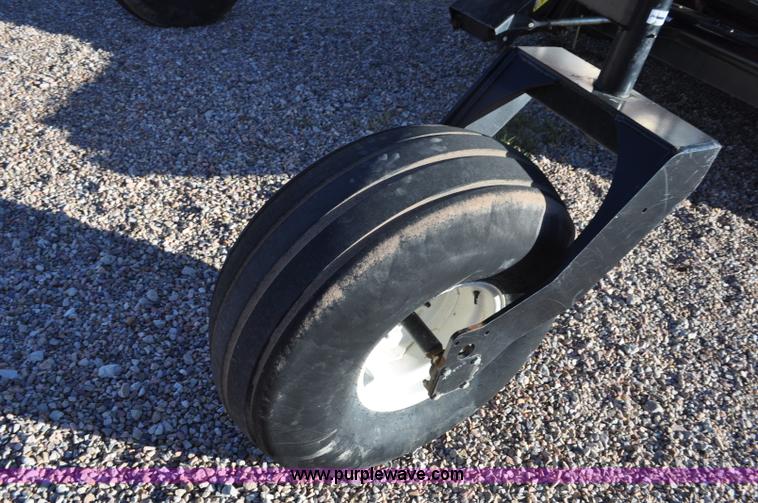 image for item F2279 2008 MacDon M200 self-propelled windrower