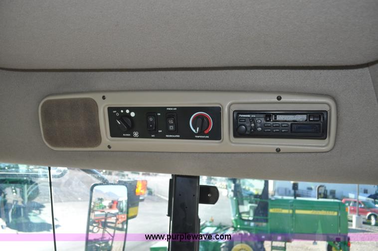 image for item F2279 2008 MacDon M200 self-propelled windrower