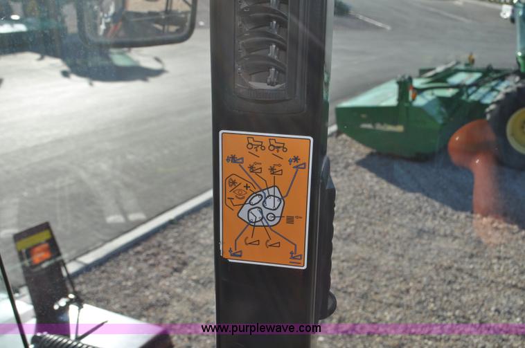 image for item F2279 2008 MacDon M200 self-propelled windrower