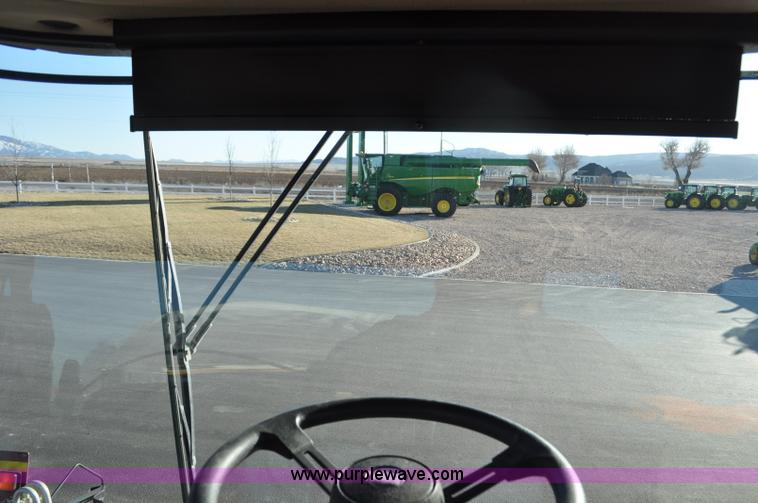 image for item F2279 2008 MacDon M200 self-propelled windrower