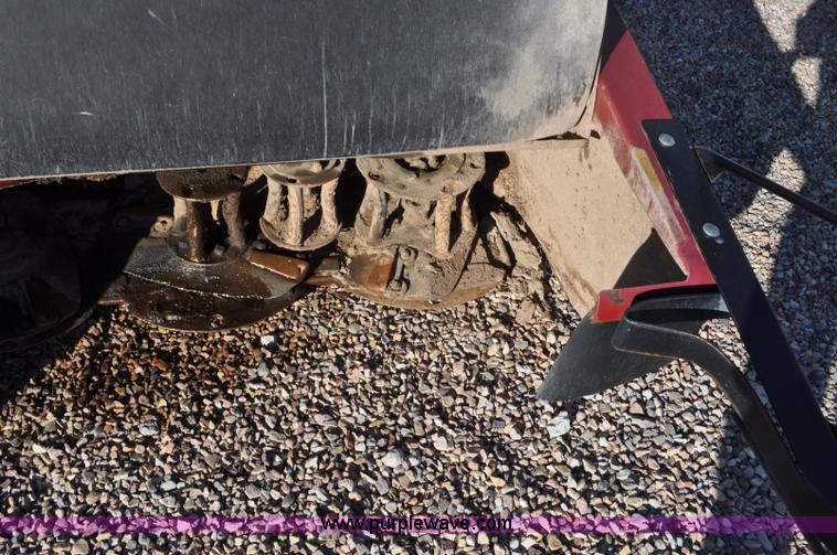 image for item F2279 2008 MacDon M200 self-propelled windrower