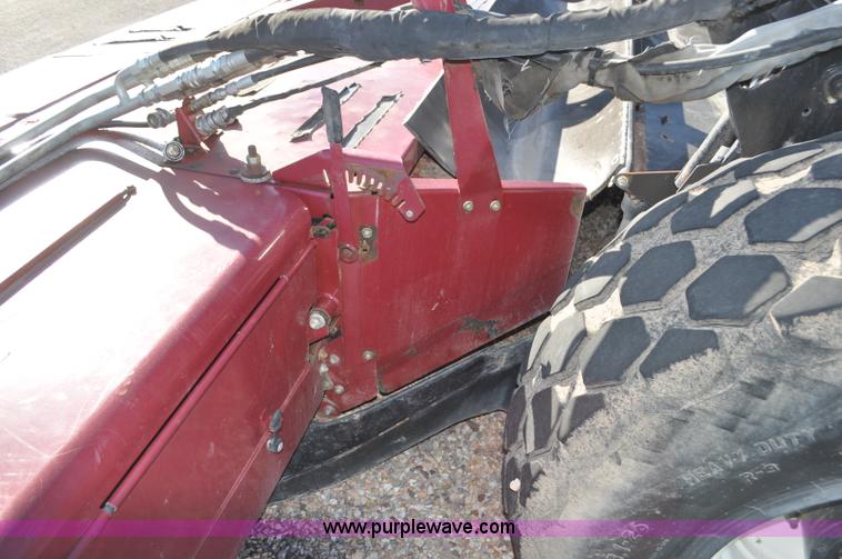 image for item F2279 2008 MacDon M200 self-propelled windrower