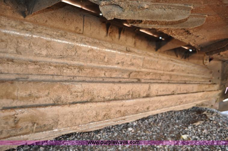 image for item F2279 2008 MacDon M200 self-propelled windrower