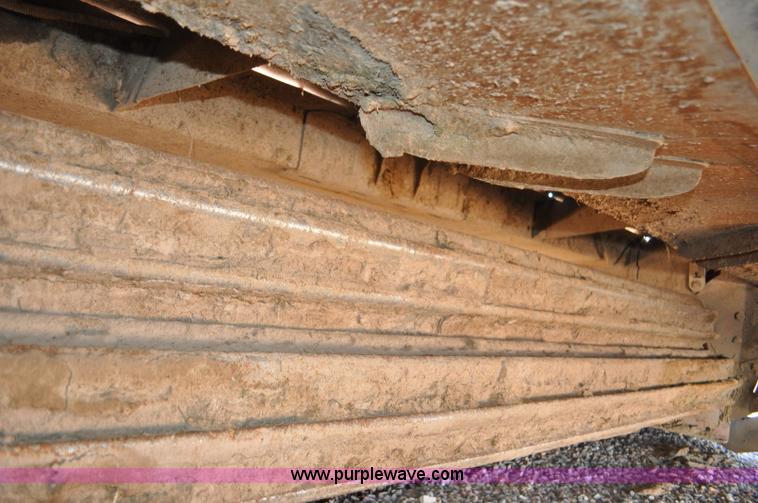 image for item F2279 2008 MacDon M200 self-propelled windrower