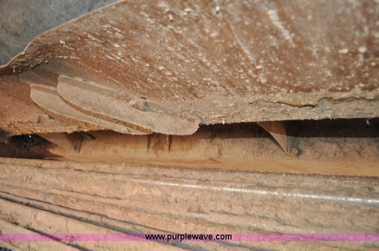 image for item F2279 2008 MacDon M200 self-propelled windrower