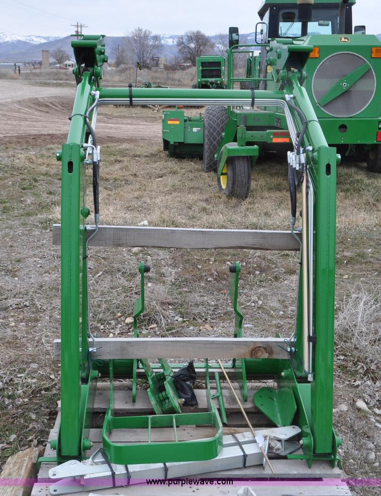 image for item F2282 John Deere 512 tractor loader