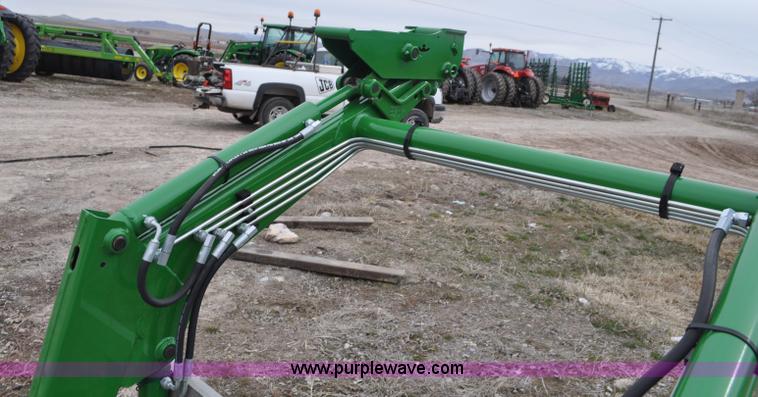 image for item F2282 John Deere 512 tractor loader