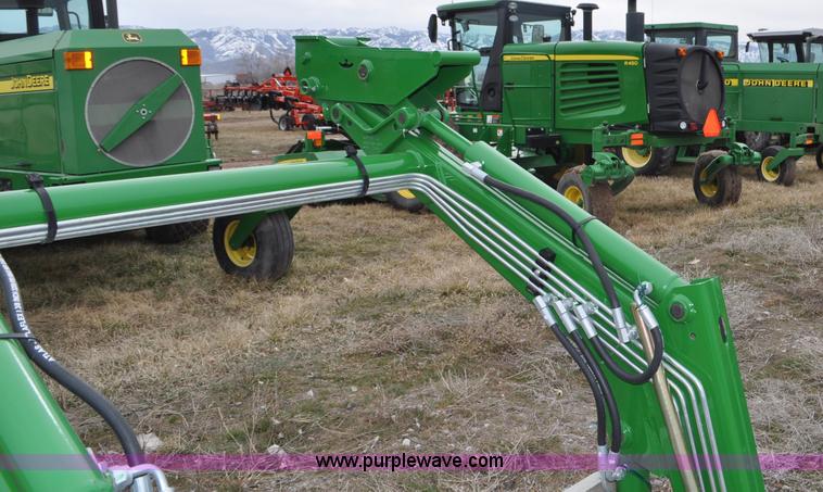 image for item F2282 John Deere 512 tractor loader