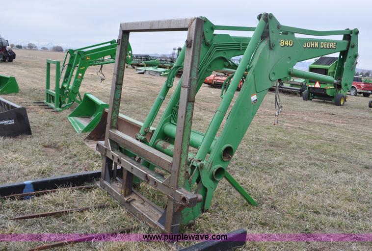 image for item F2283 John Deere 840 tractor loader