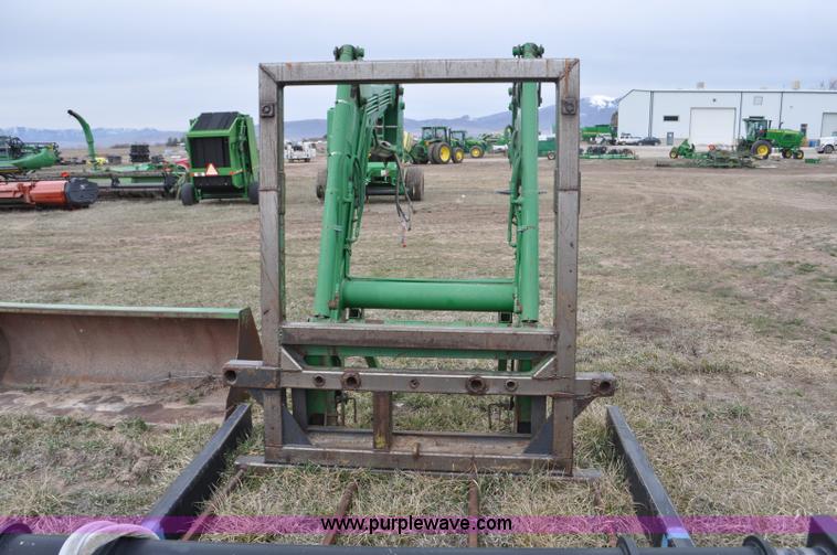 image for item F2283 John Deere 840 tractor loader