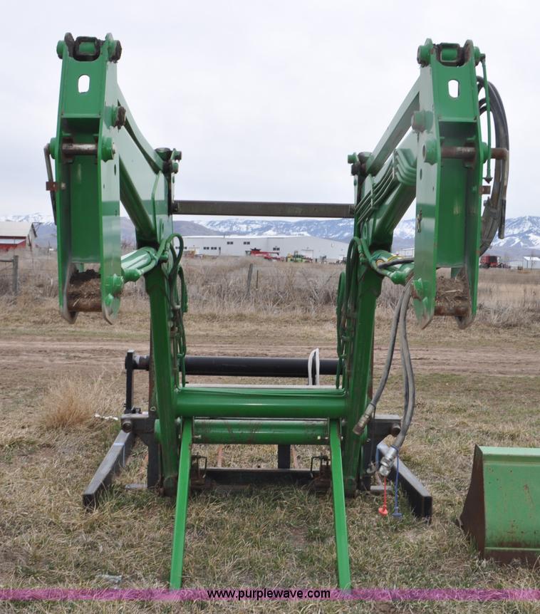 image for item F2283 John Deere 840 tractor loader