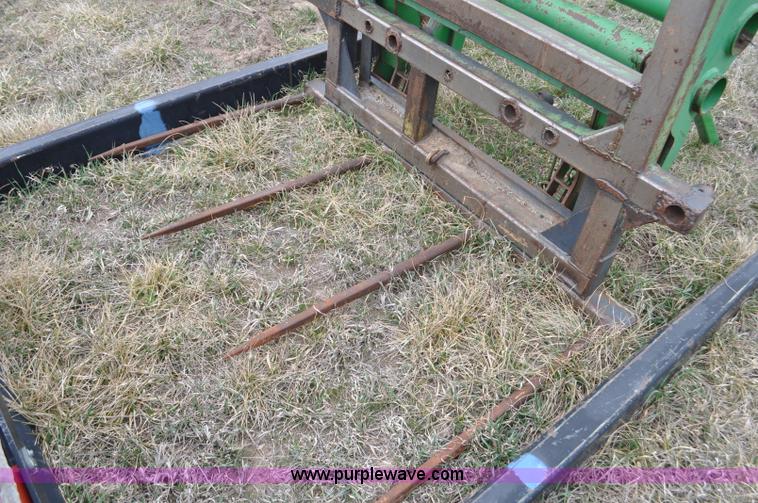 image for item F2283 John Deere 840 tractor loader