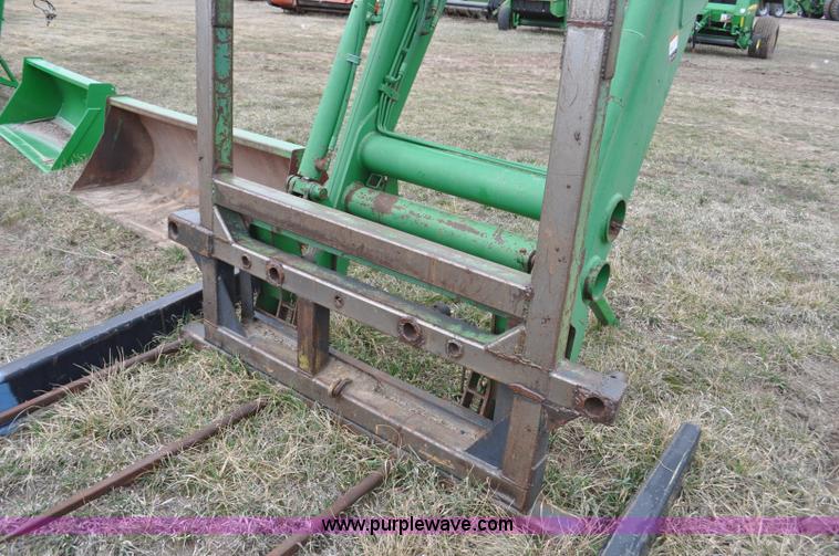 image for item F2283 John Deere 840 tractor loader