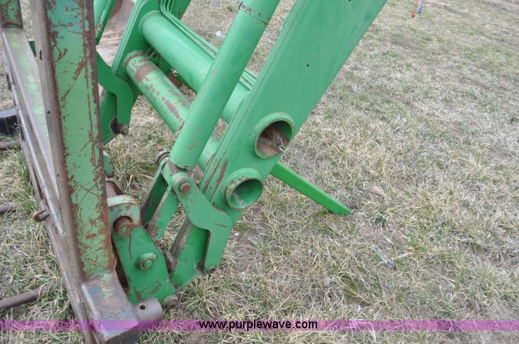 image for item F2283 John Deere 840 tractor loader