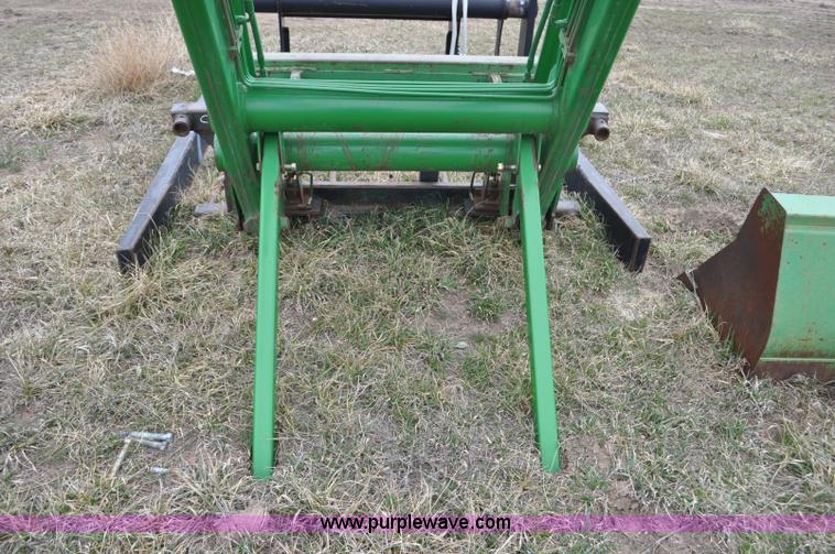 image for item F2283 John Deere 840 tractor loader
