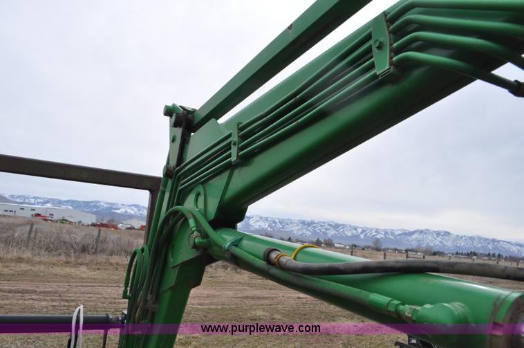 image for item F2283 John Deere 840 tractor loader
