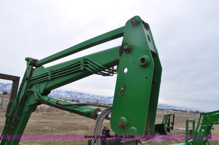 image for item F2283 John Deere 840 tractor loader
