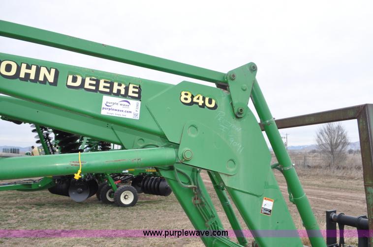 image for item F2283 John Deere 840 tractor loader