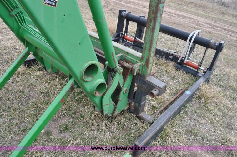 image for item F2283 John Deere 840 tractor loader