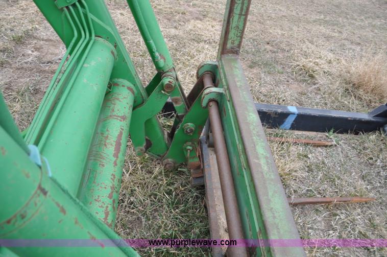 image for item F2283 John Deere 840 tractor loader