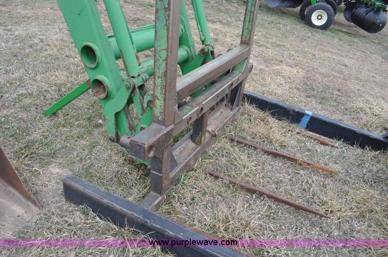 image for item F2283 John Deere 840 tractor loader