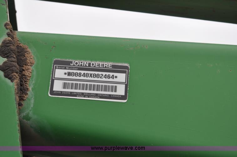 image for item F2283 John Deere 840 tractor loader